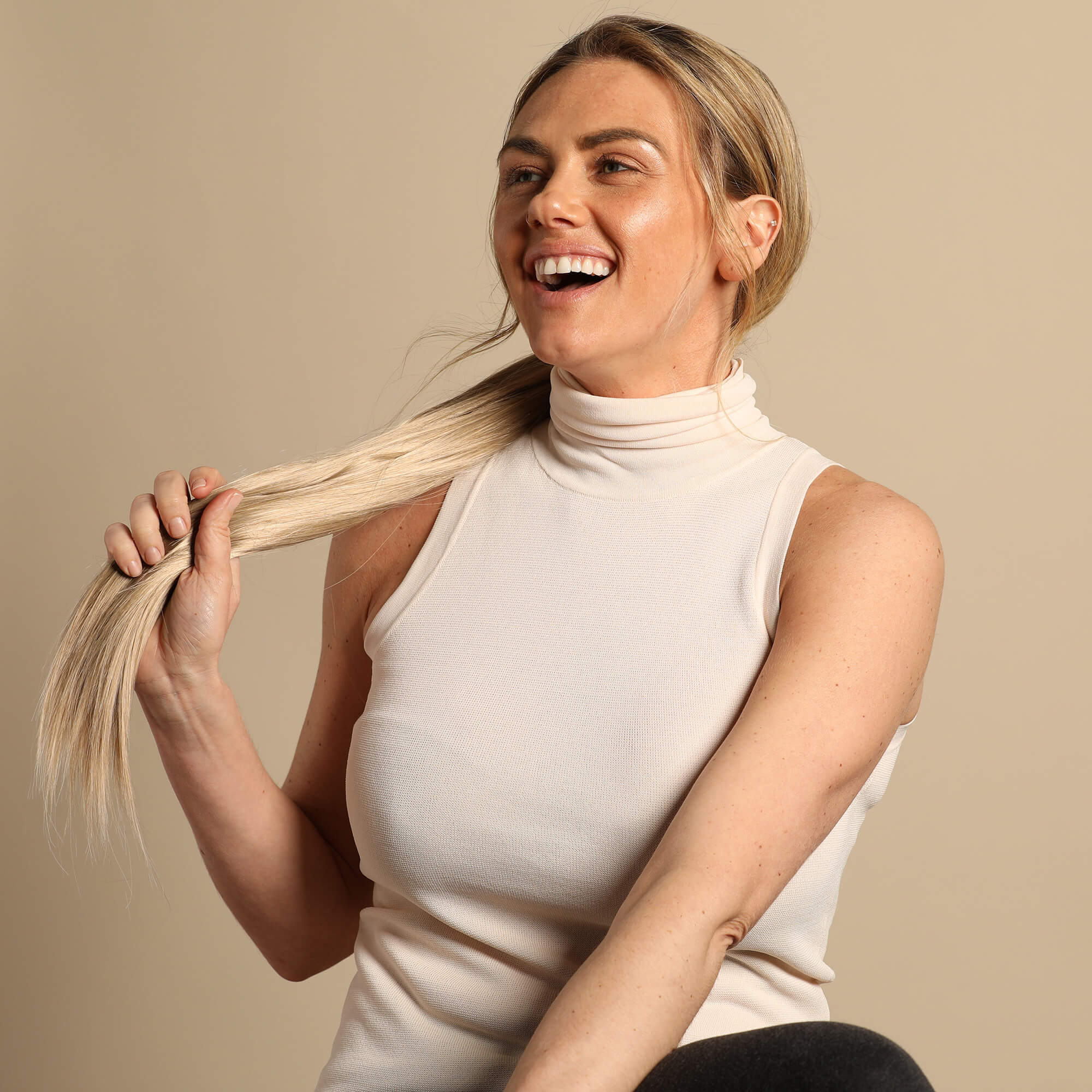 The Bree Ponytail Hair Extension - Ashy Highlighted